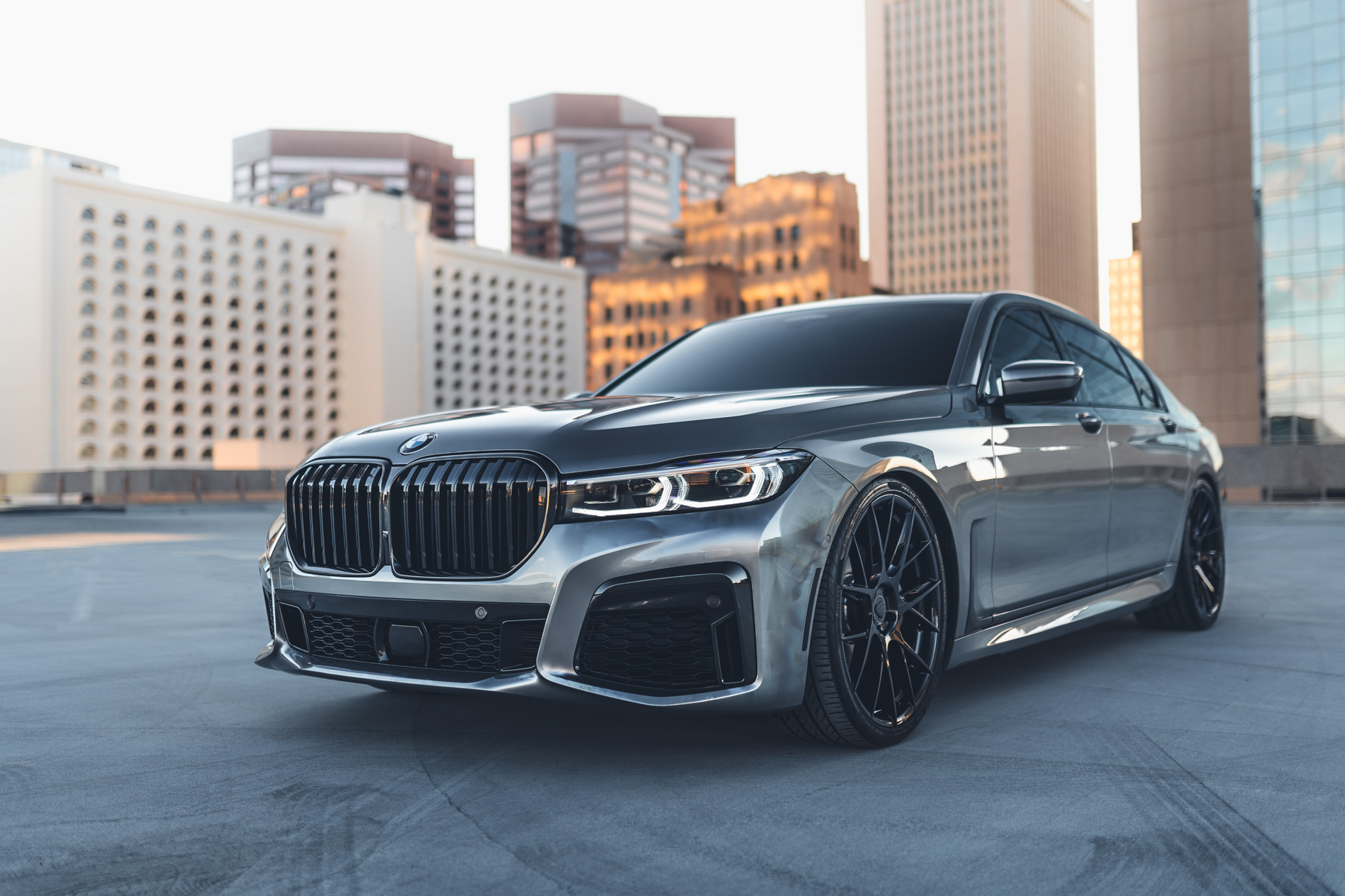 A 2020 BMW 750i on 20 Inch Blaque Diamond BD-F18 Gloss Black Wheels