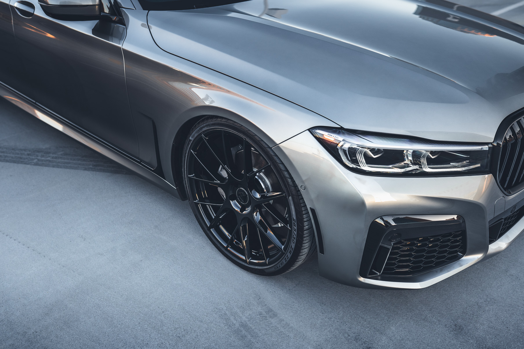 A 2020 BMW 750i on 20 Inch Blaque Diamond BD-F18 Gloss Black Wheels