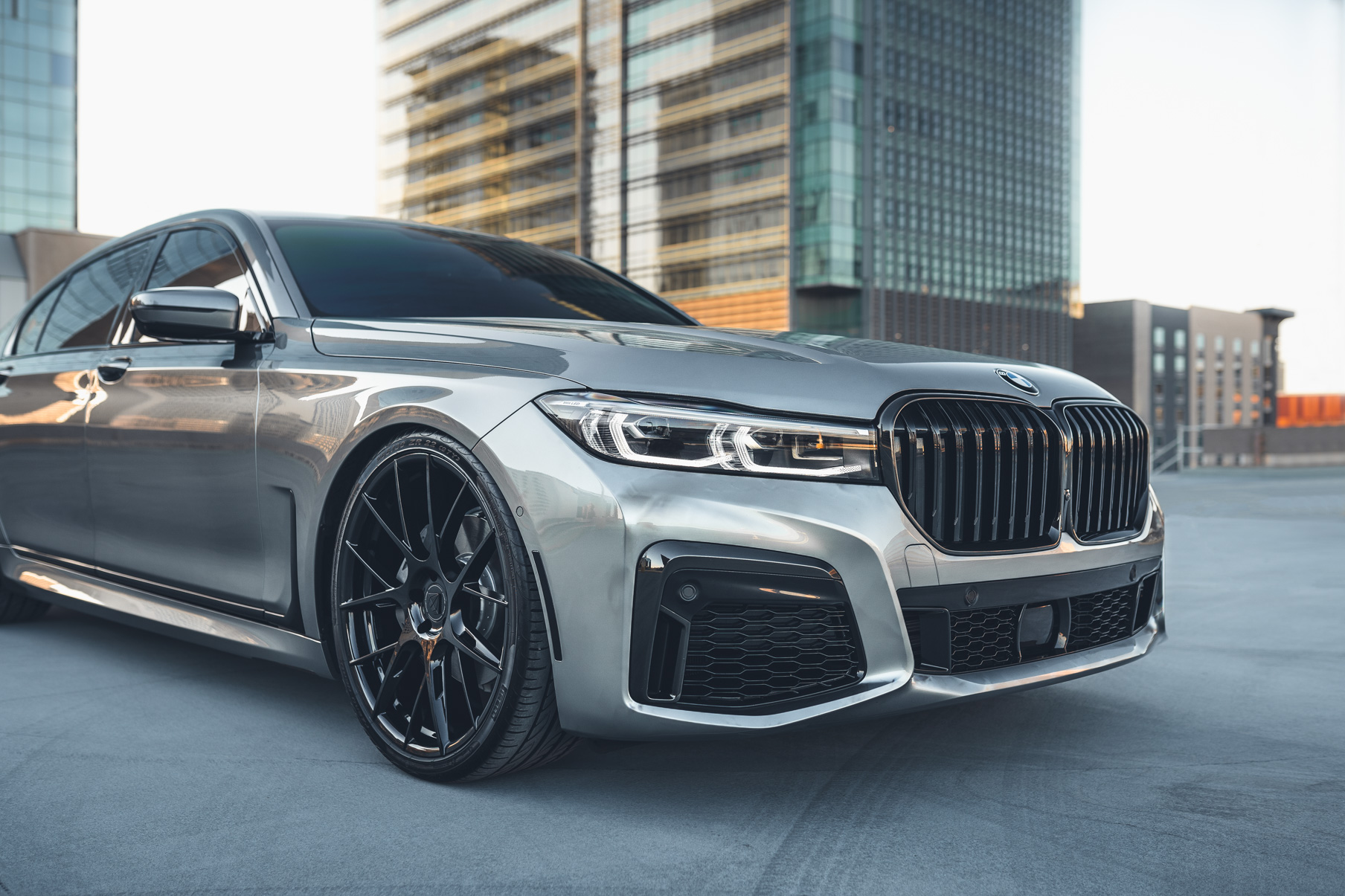 A 2020 BMW 750i on 20 Inch Blaque Diamond BD-F18 Gloss Black Wheels