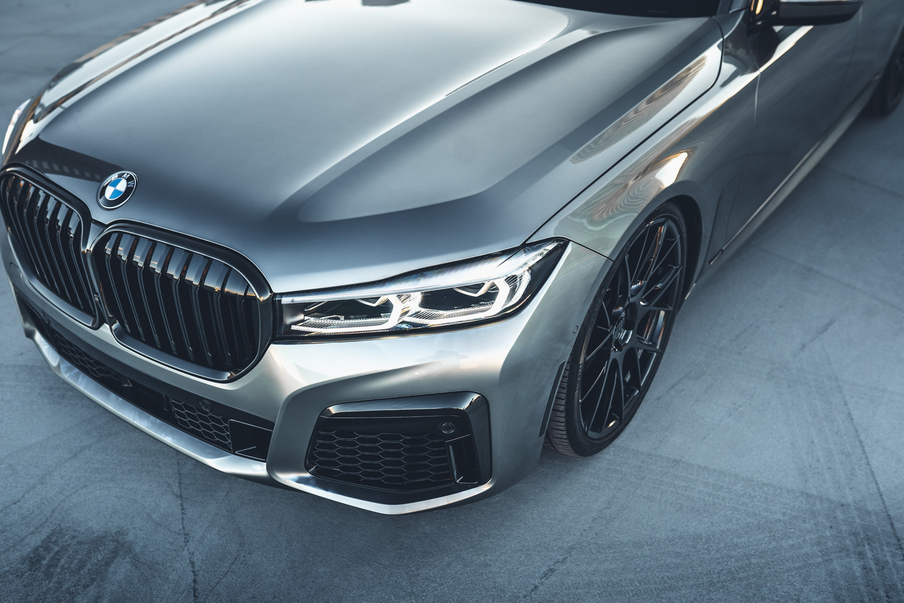 A 2020 BMW 750i on 20 Inch Blaque Diamond BD-F18 Gloss Black Wheels