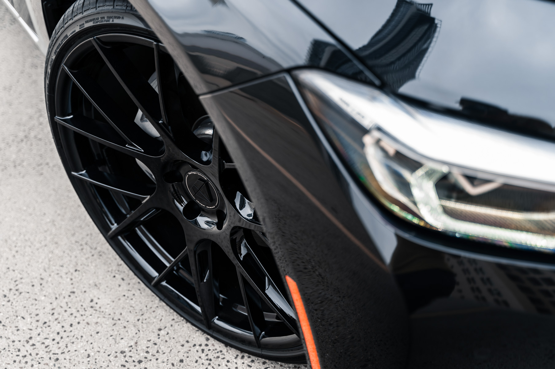 A 2020 BMW 740i on 20 Inch Blaque Diamond BD-F18 Gloss Black Wheels
