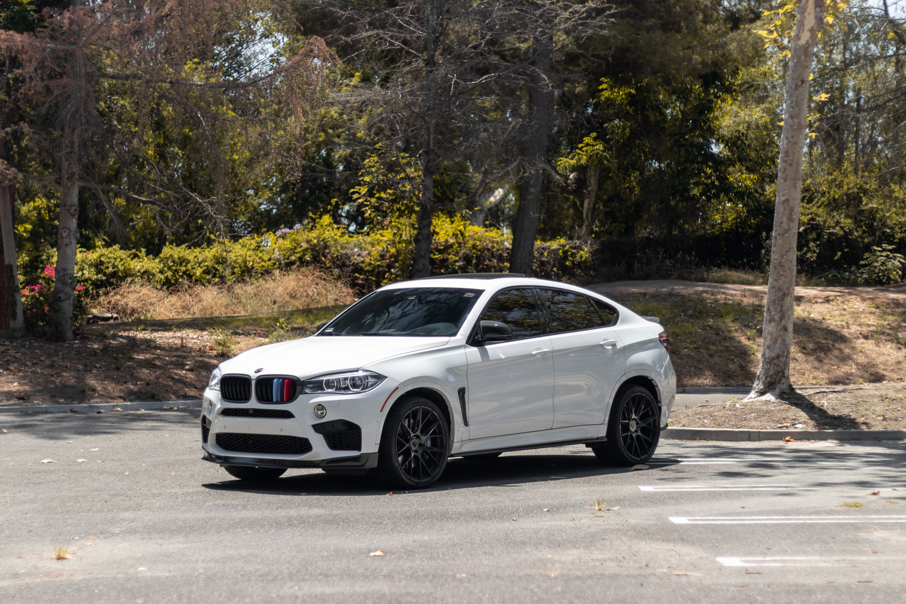 A 2018 BMW X6M on 22 Inch Blaque Diamond BD-F18 Gloss Black Wheels