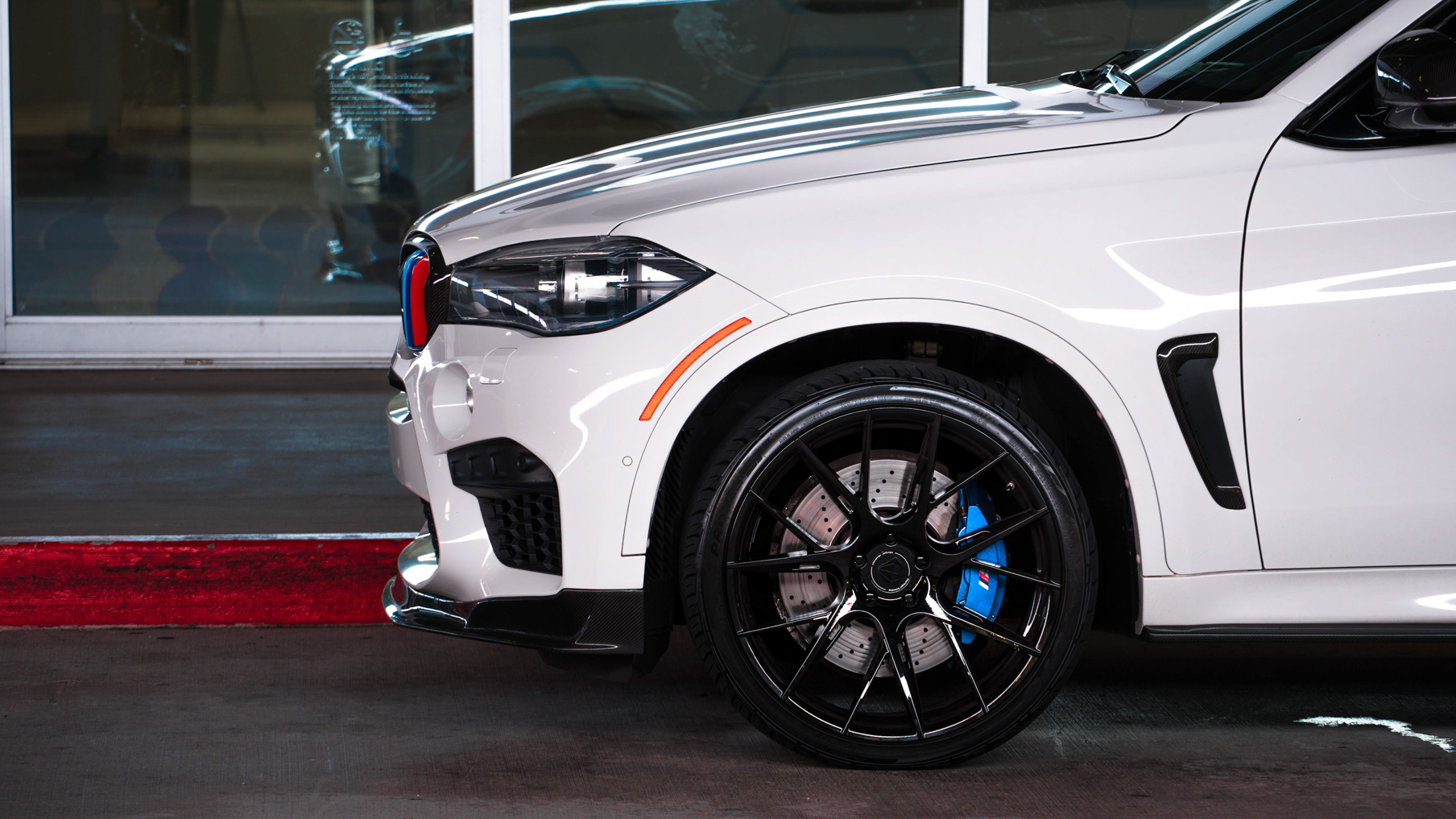 A 2018 BMW X6M on 22 Inch Blaque Diamond BD-F18 Gloss Black Wheels