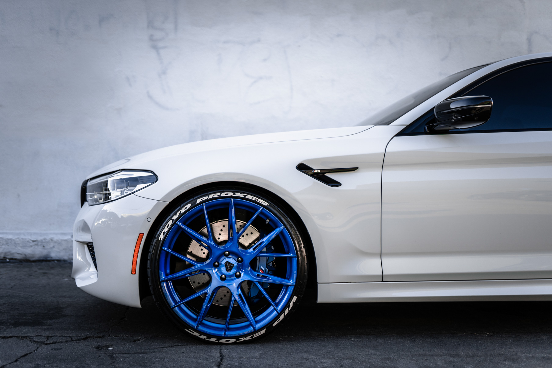 A 2018 BMW M5 on 20 Inch Blaque Diamond BD-F18 Brushed Blue Wheels