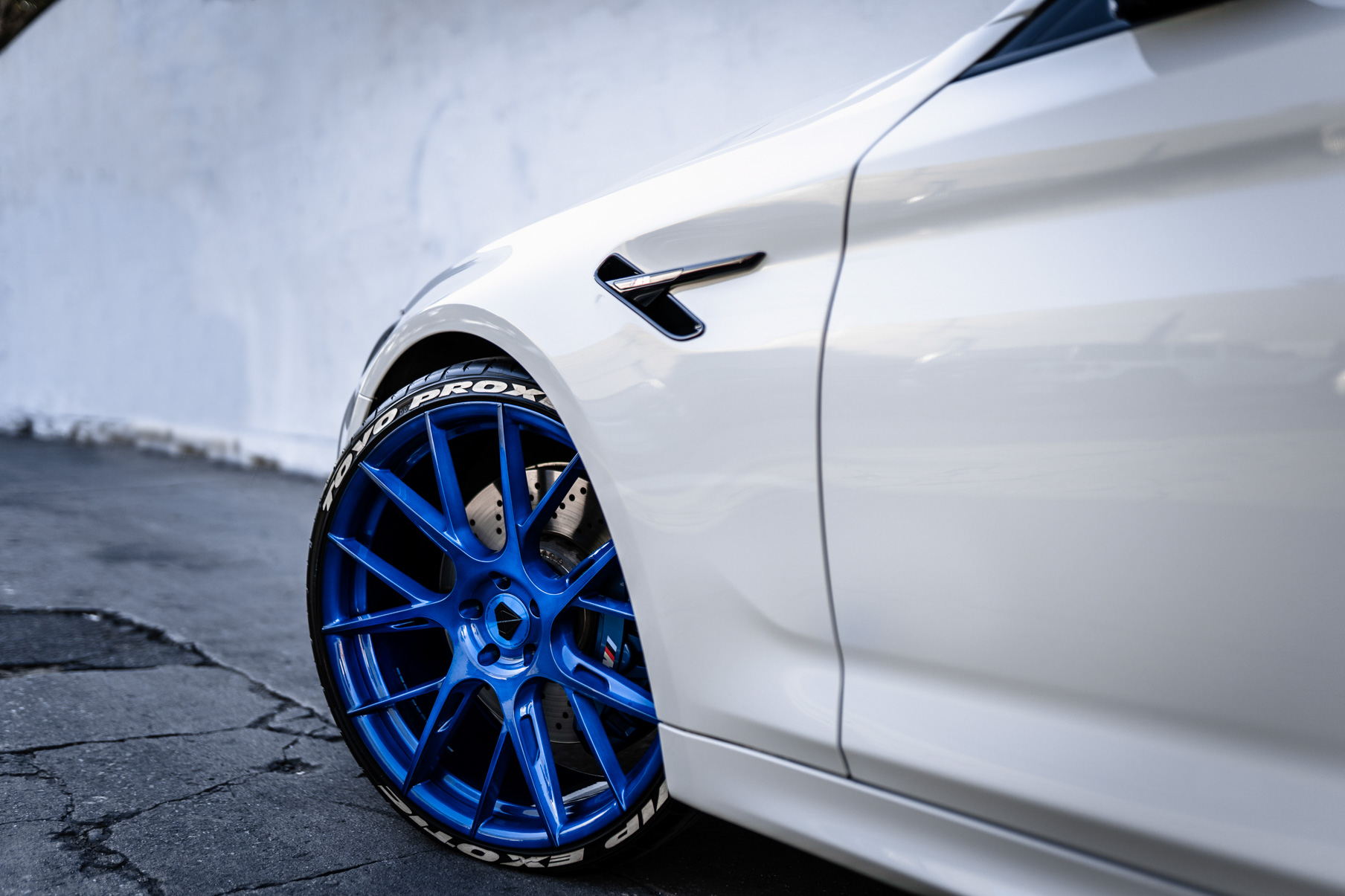 A 2018 BMW M5 on 20 Inch Blaque Diamond BD-F18 Brushed Blue Wheels