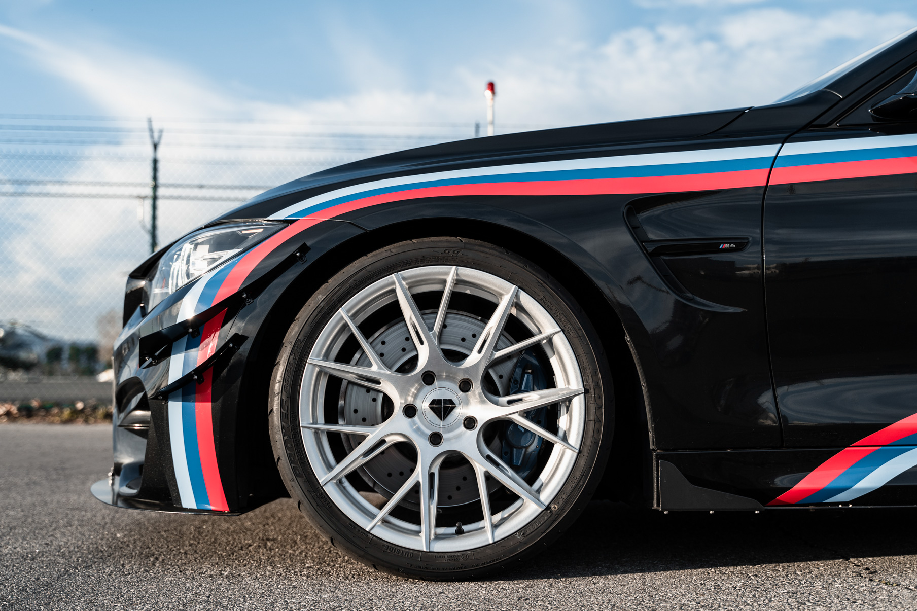 A 2018 BMW M4 Competition on 19 Inch Blaque Diamond BD-F18 Brushed Silver Wheels