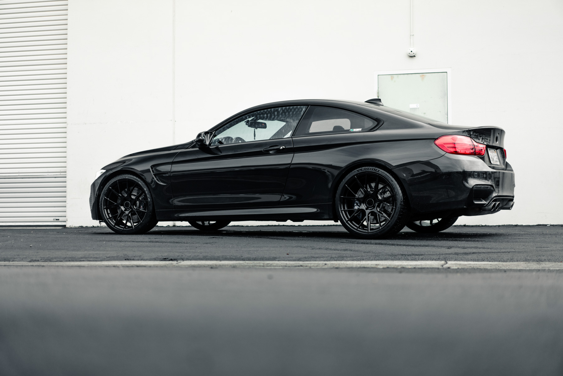 A 2017 BMW M4 on 20 Inch Blaque Diamond BD-F18 Gloss Black Wheels