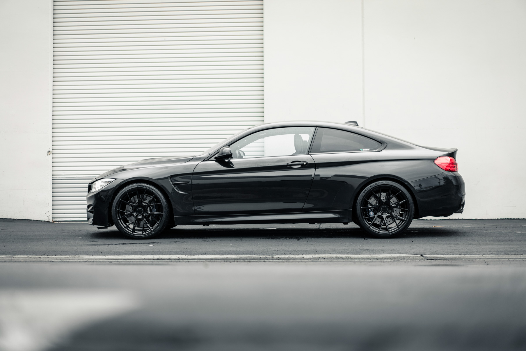 A 2017 BMW M4 on 20 Inch Blaque Diamond BD-F18 Gloss Black Wheels