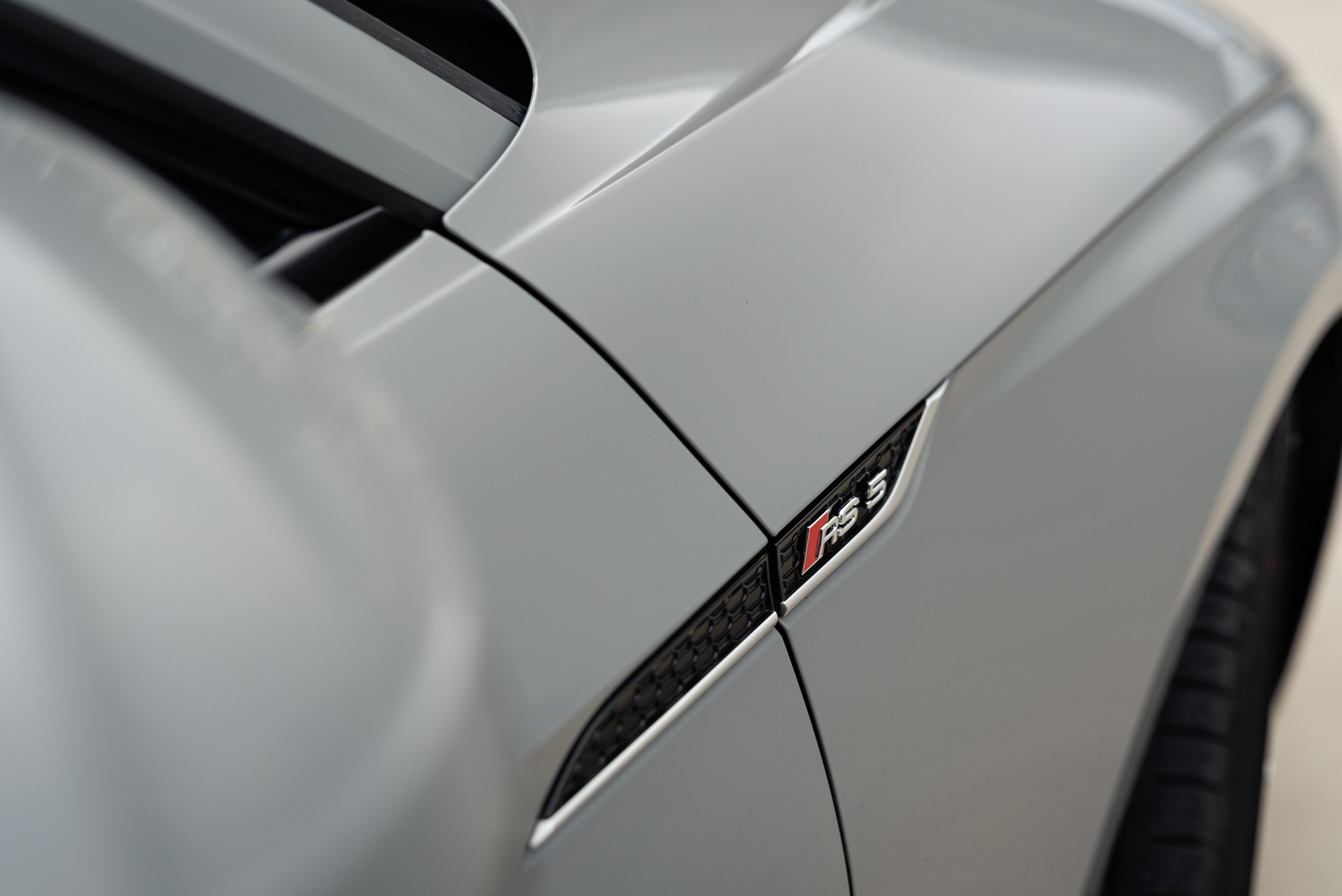 A 2018 Audi RS5 on 20 Inch Blaque Diamond BD-F18 Brushed Silver Wheels