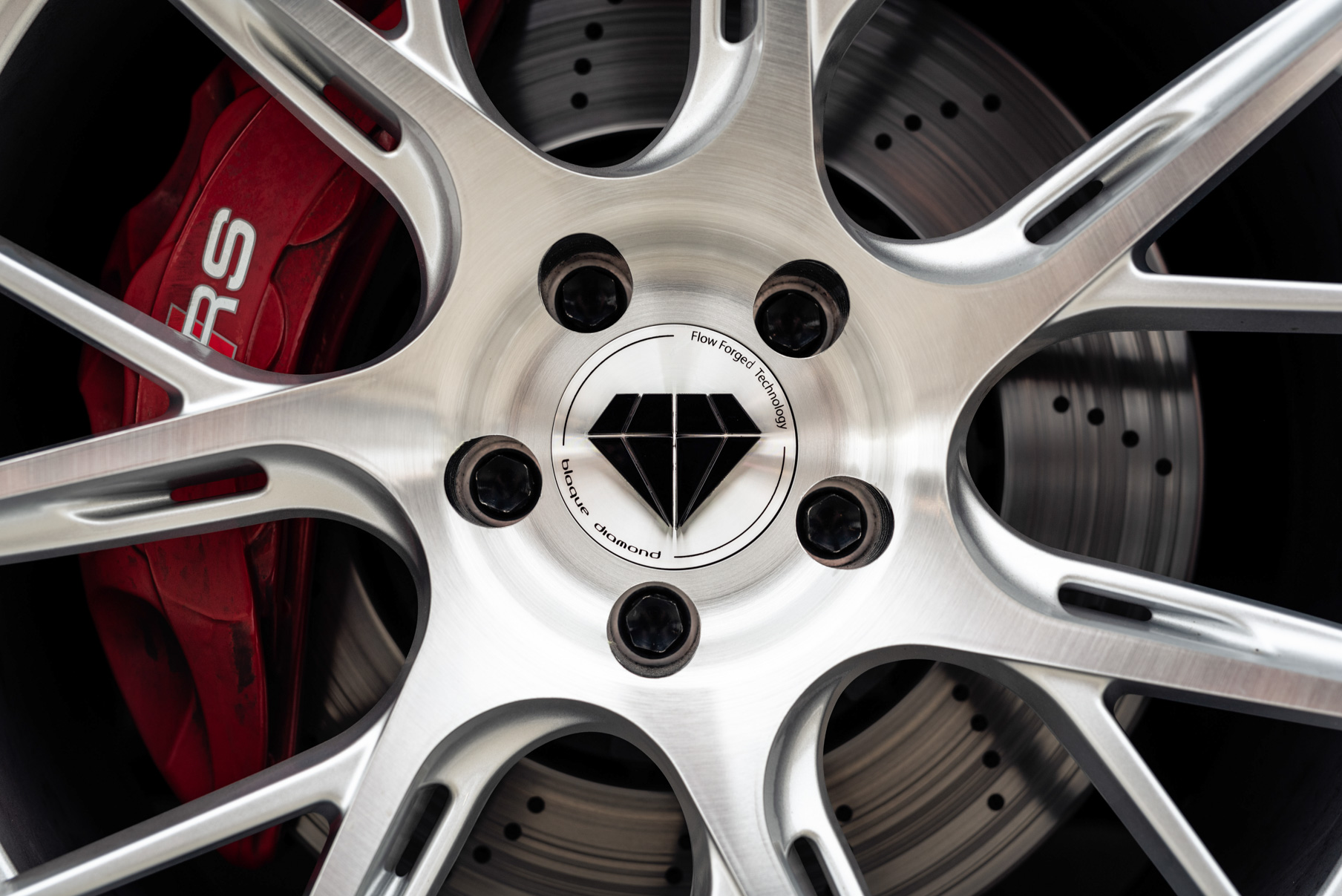 A 2018 Audi RS5 on 20 Inch Blaque Diamond BD-F18 Brushed Silver Wheels