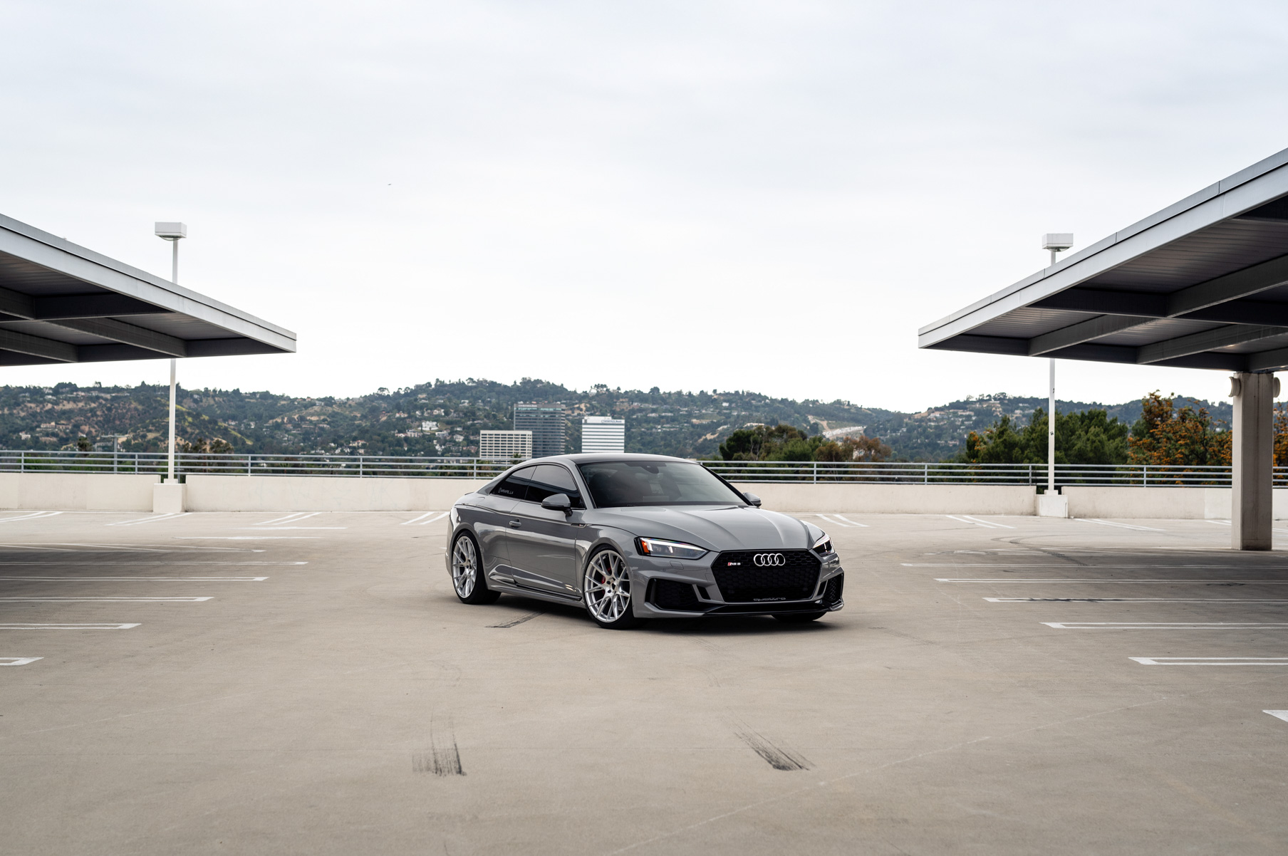 A 2018 Audi RS5 on 20 Inch Blaque Diamond BD-F18 Brushed Silver Wheels
