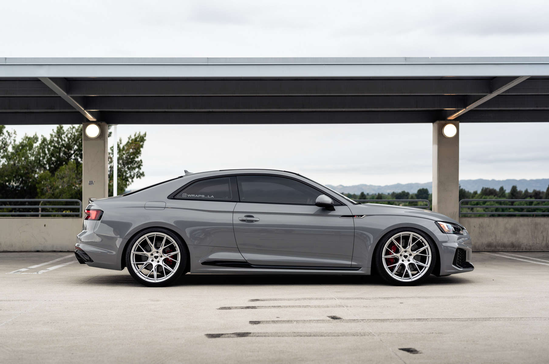 A 2018 Audi RS5 on 20 Inch Blaque Diamond BD-F18 Brushed Silver Wheels