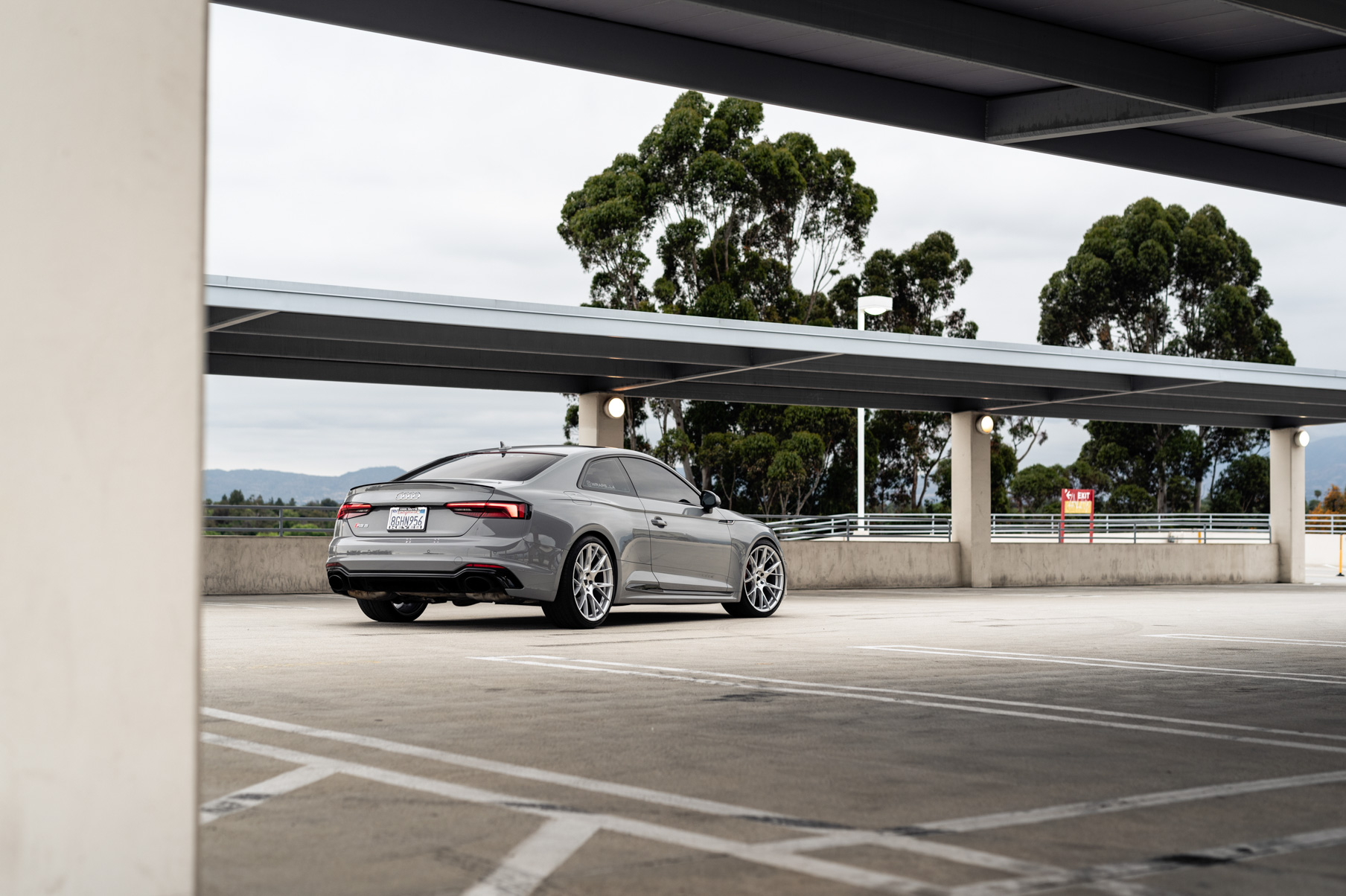 A 2018 Audi RS5 on 20 Inch Blaque Diamond BD-F18 Brushed Silver Wheels