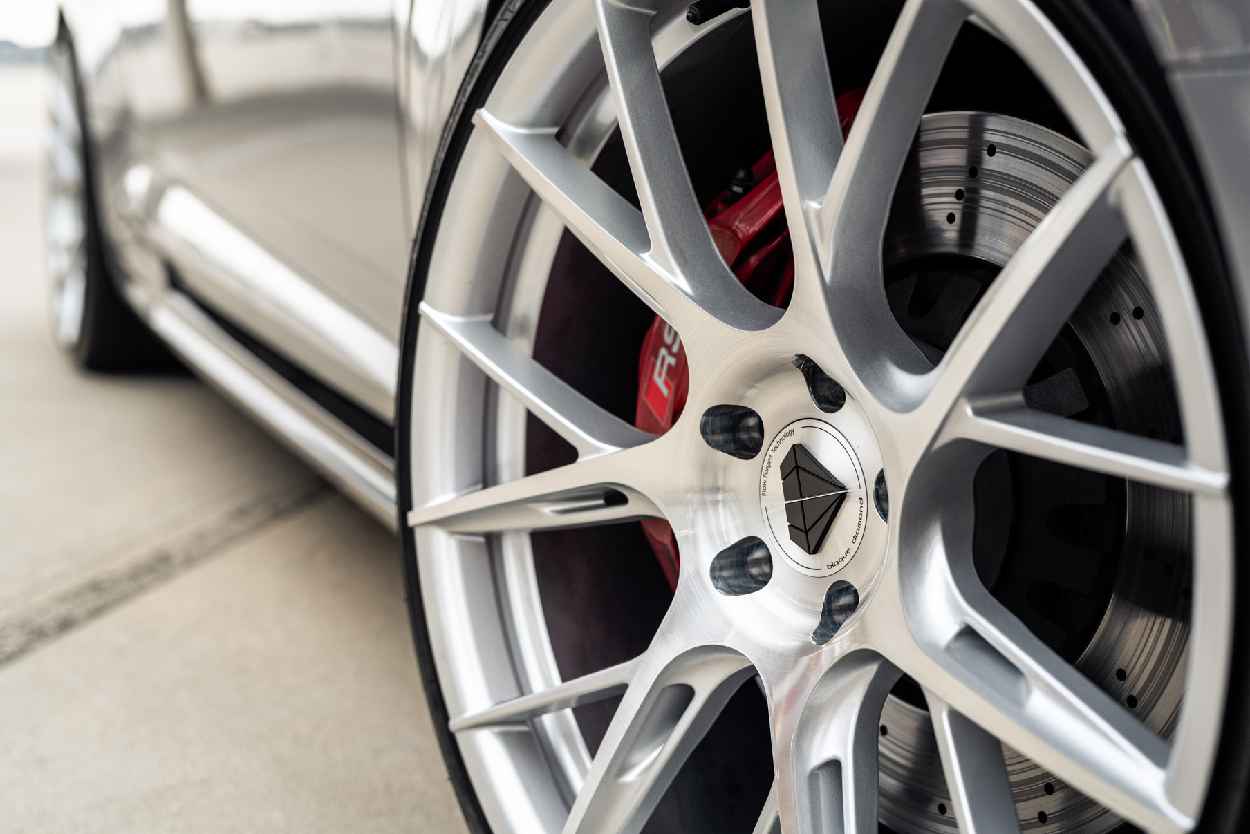 A 2018 Audi RS5 on 20 Inch Blaque Diamond BD-F18 Brushed Silver Wheels