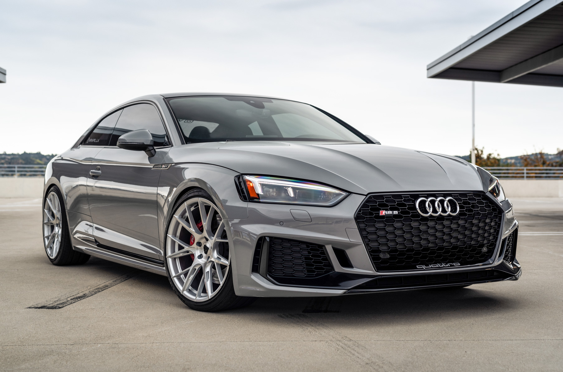 A 2018 Audi RS5 on 20 Inch Blaque Diamond BD-F18 Brushed Silver Wheels