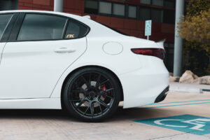 An Alfa Romero Giulia on 20 Inch Blaque Diamond BD-F18 Gloss Black Wheels
