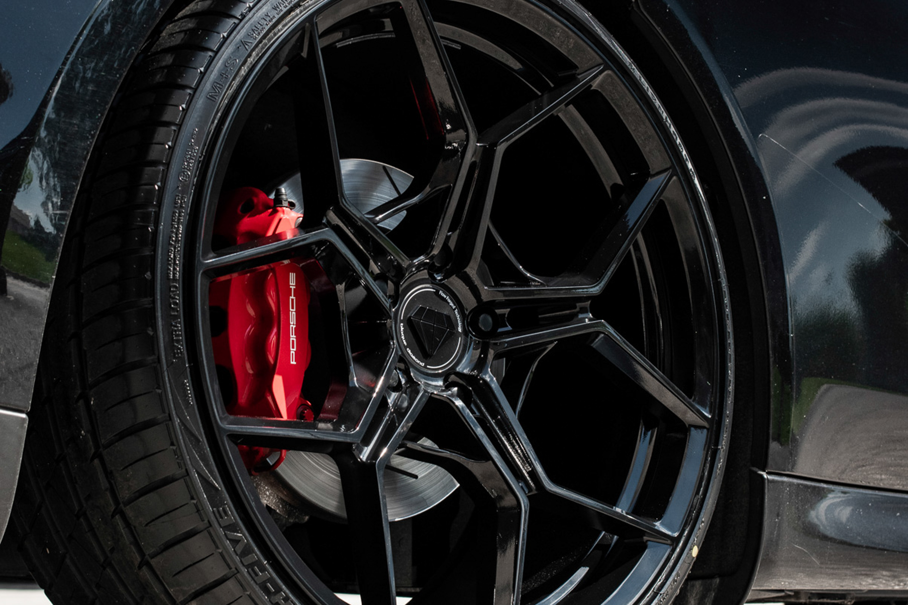 A 2016 Porsche Panamera 4S on 20 Inch Blaque Diamond BD-F25 Gloss Black Wheels