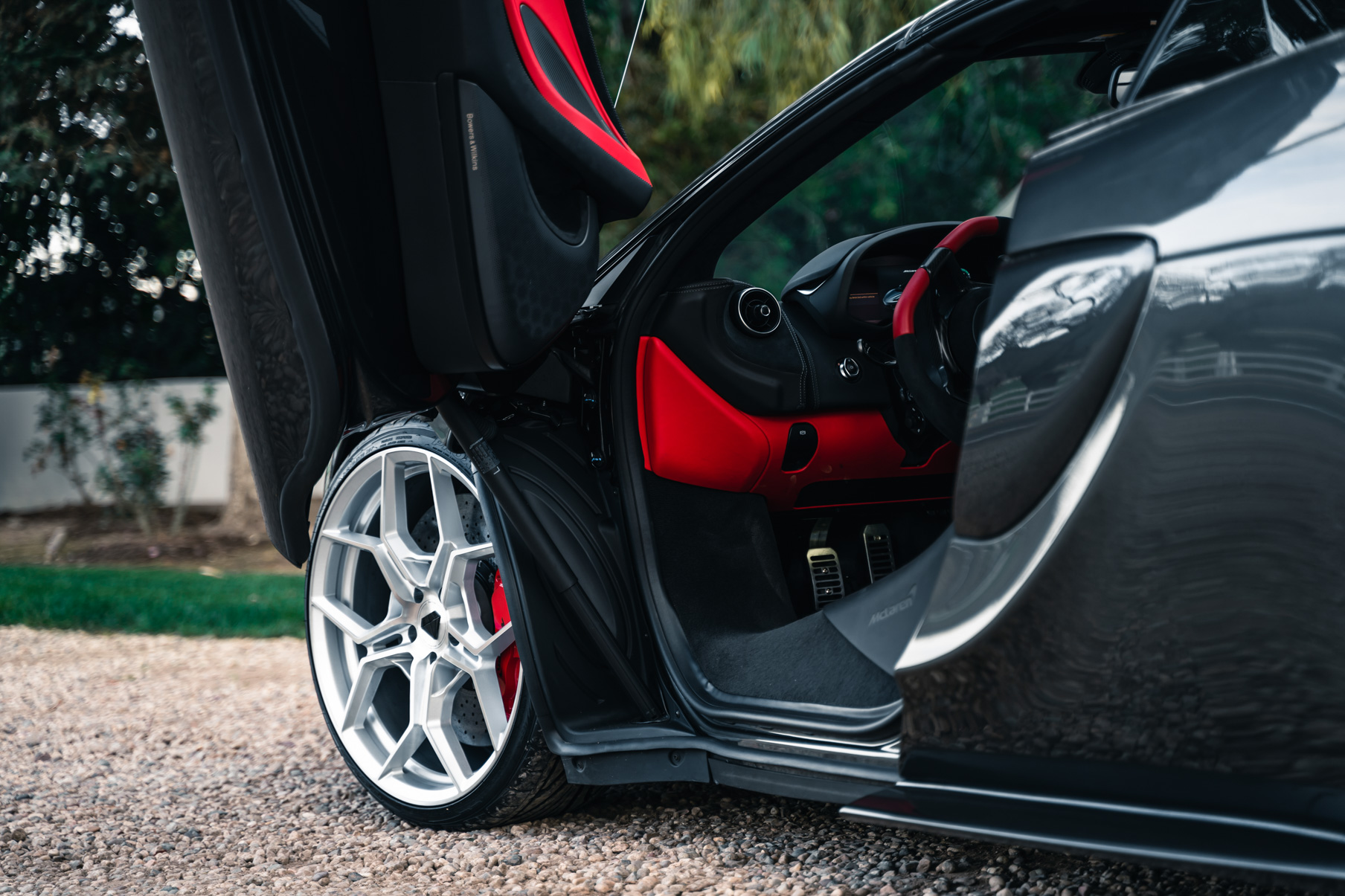 A 2019 McLaren 570s on 20 Inch Blaque Diamond BD-F25 Brushed Silver Wheels