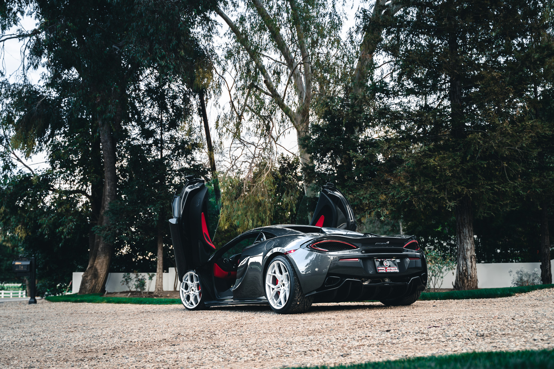 A 2019 McLaren 570s on 20 Inch Blaque Diamond BD-F25 Brushed Silver Wheels