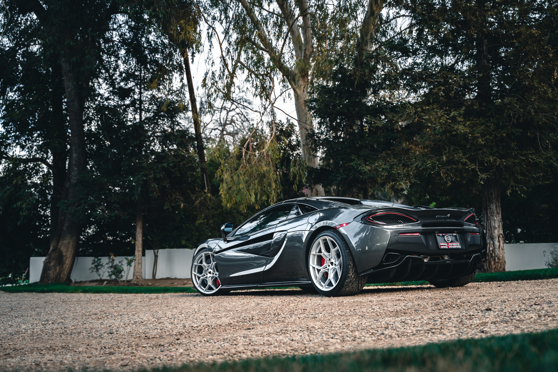 A 2019 McLaren 570s on 20 Inch Blaque Diamond BD-F25 Brushed Silver Wheels