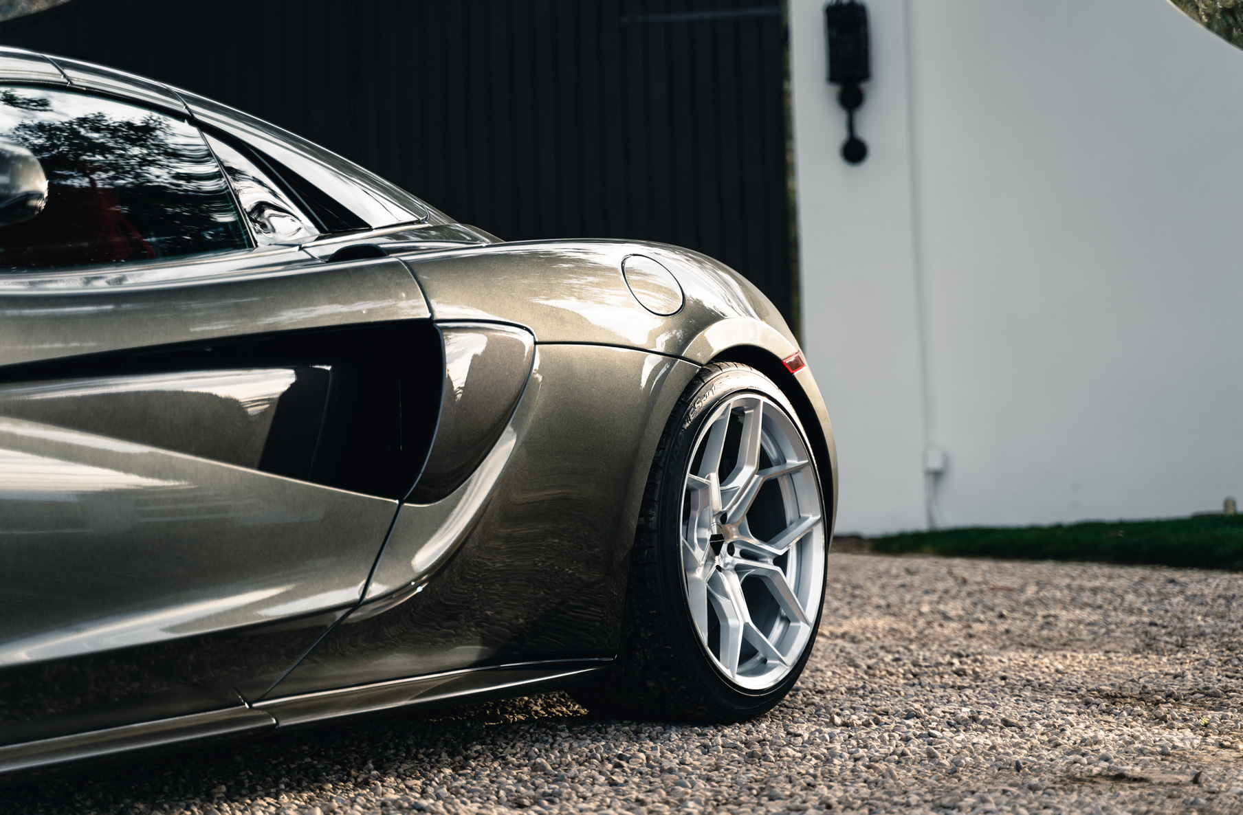 A 2019 McLaren 570s on 20 Inch Blaque Diamond BD-F25 Brushed Silver Wheels