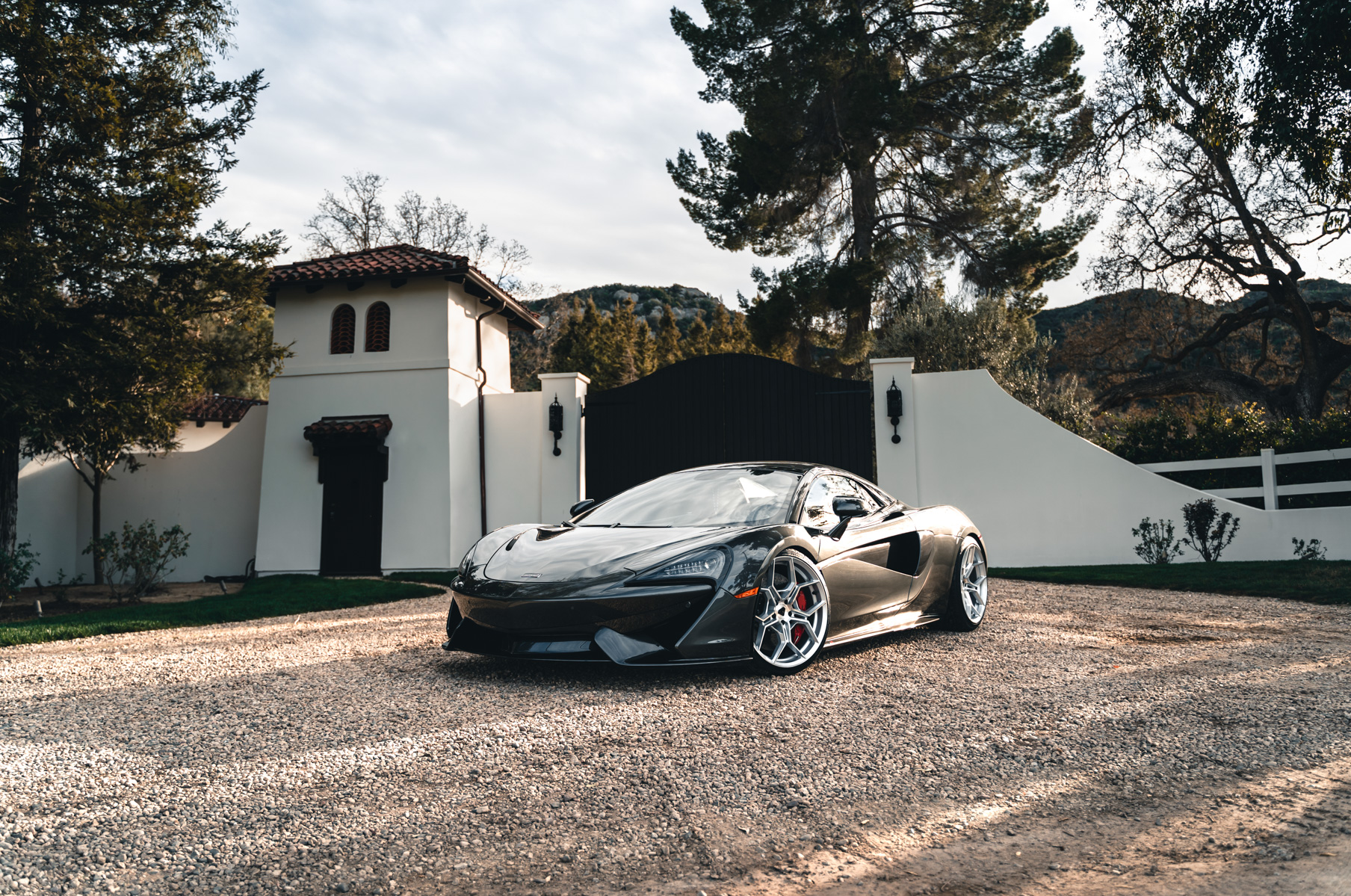 A 2019 McLaren 570s on 20 Inch Blaque Diamond BD-F25 Brushed Silver Wheels