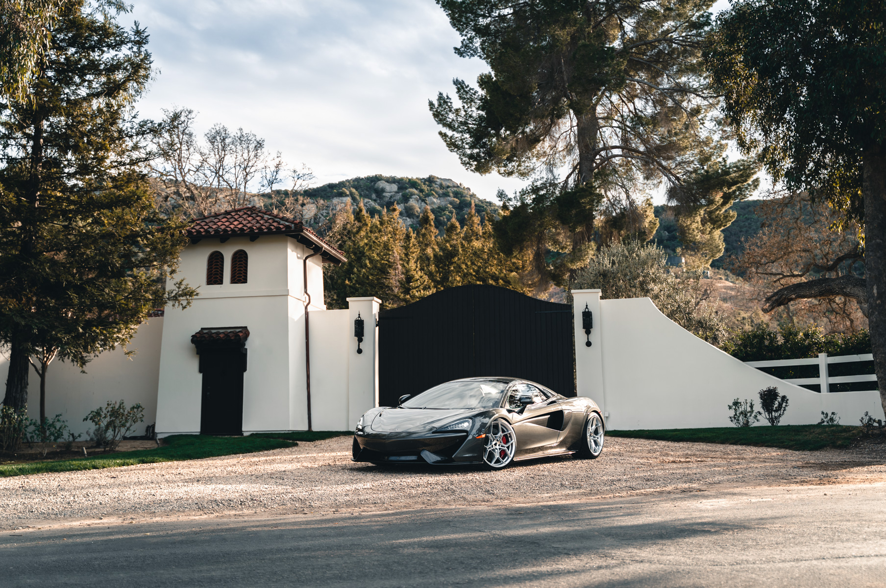 A 2019 McLaren 570s on 20 Inch Blaque Diamond BD-F25 Brushed Silver Wheels