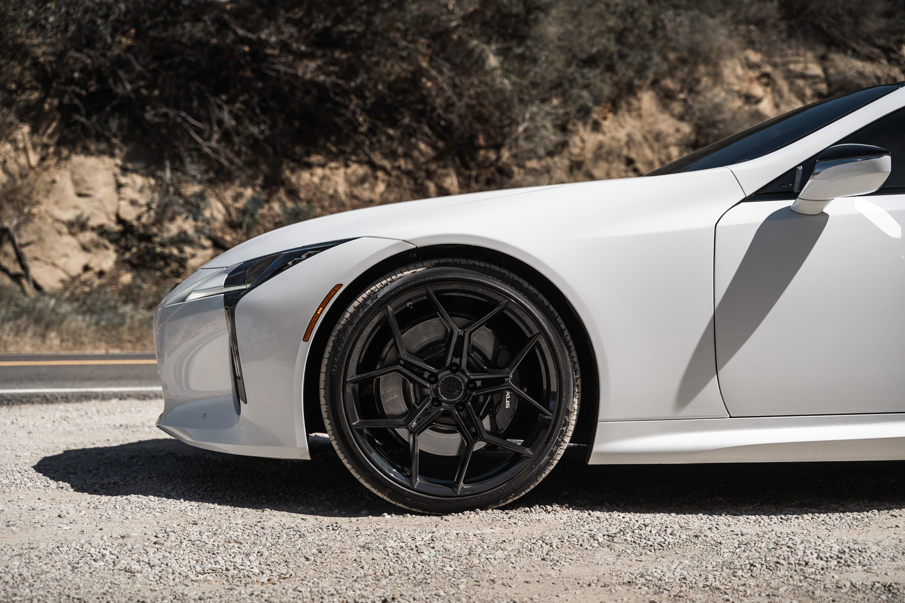 A 2018 Lexus LC500 on 20 Inch Blaque Diamond BD-F25 Gloss Black Wheels