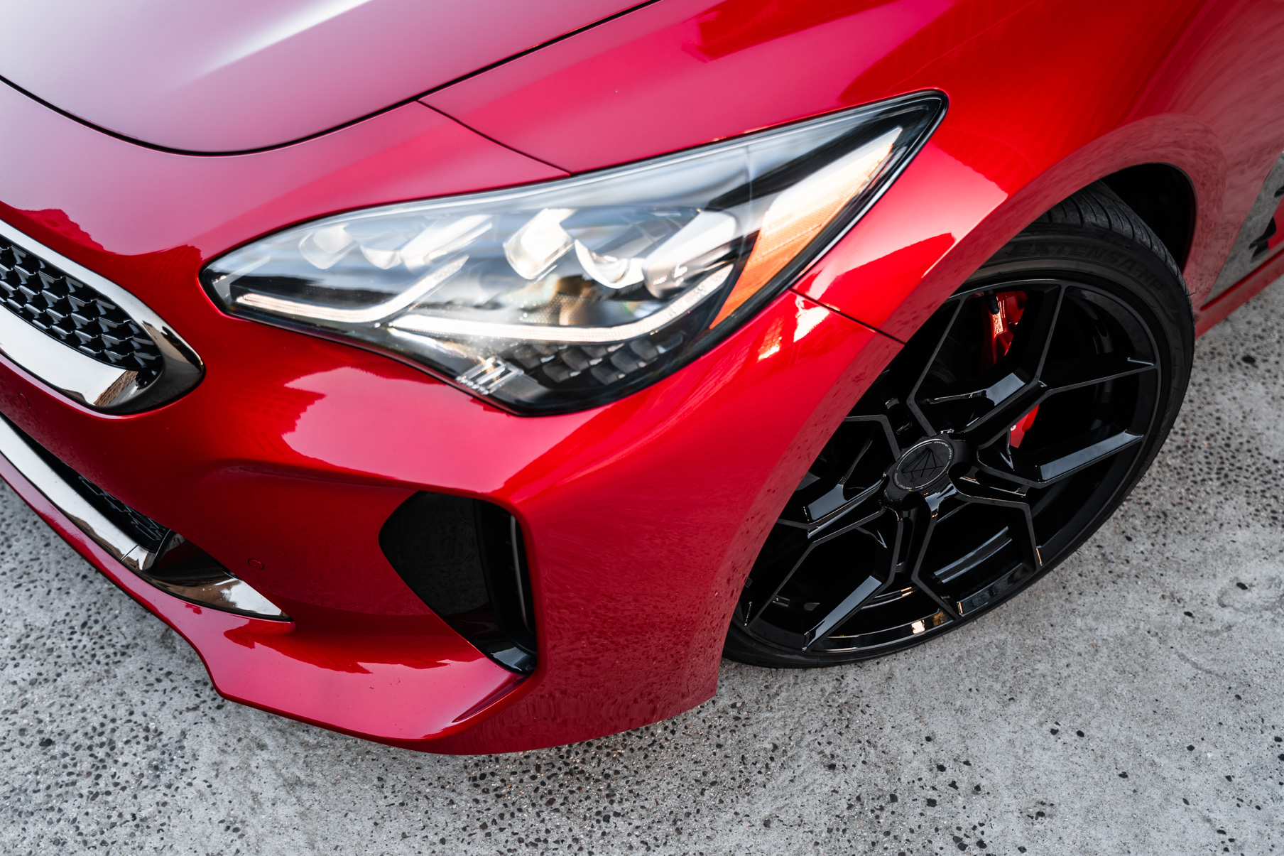 A 2019 Kia Stinger GT on 20 Inch Blaque Diamond BD-F25 Gloss Black Wheels