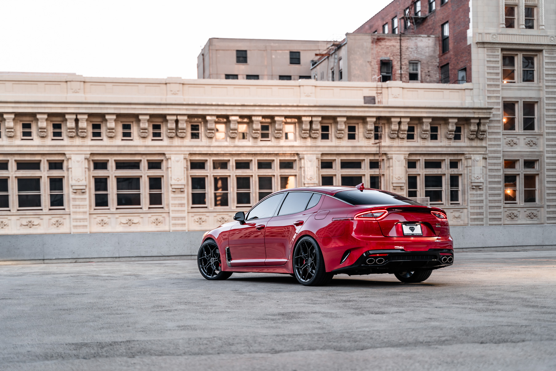 A 2019 Kia Stinger GT on 20 Inch Blaque Diamond BD-F25 Gloss Black Wheels