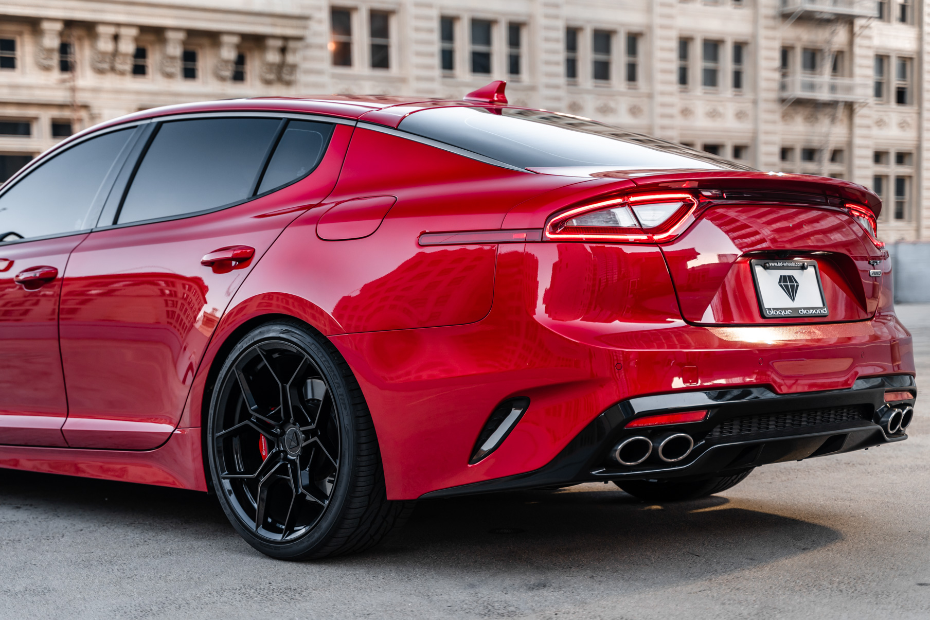 A 2019 Kia Stinger GT on 20 Inch Blaque Diamond BD-F25 Gloss Black Wheels
