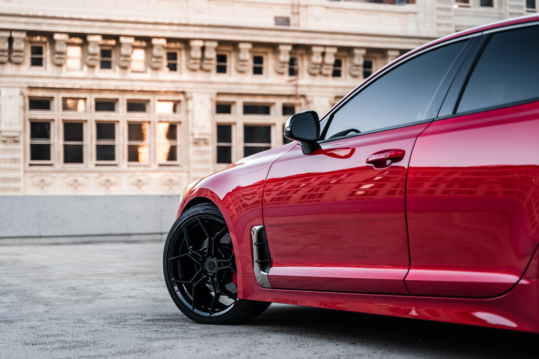A 2019 Kia Stinger GT on 20 Inch Blaque Diamond BD-F25 Gloss Black Wheels