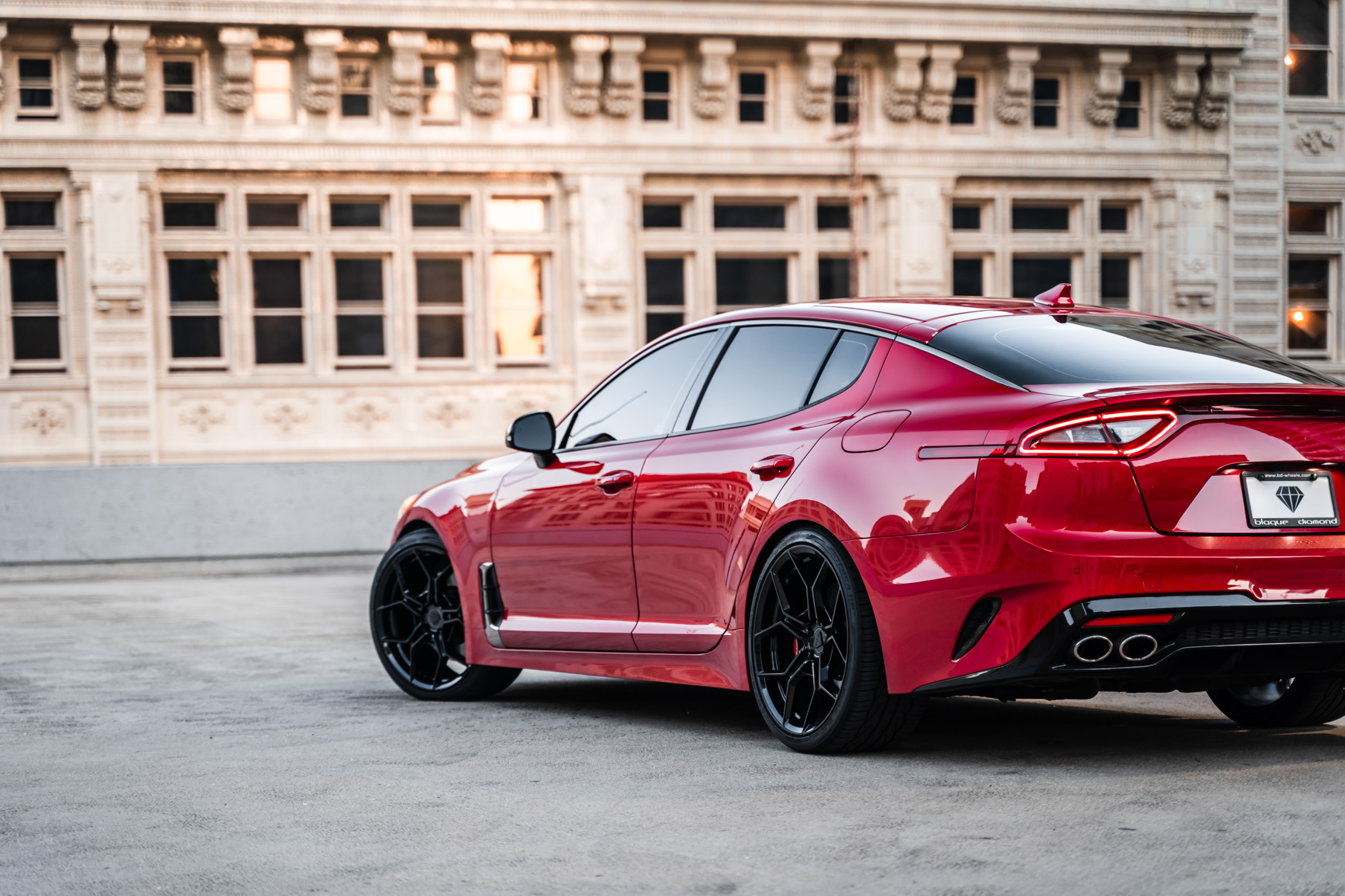 A 2019 Kia Stinger GT on 20 Inch Blaque Diamond BD-F25 Gloss Black Wheels