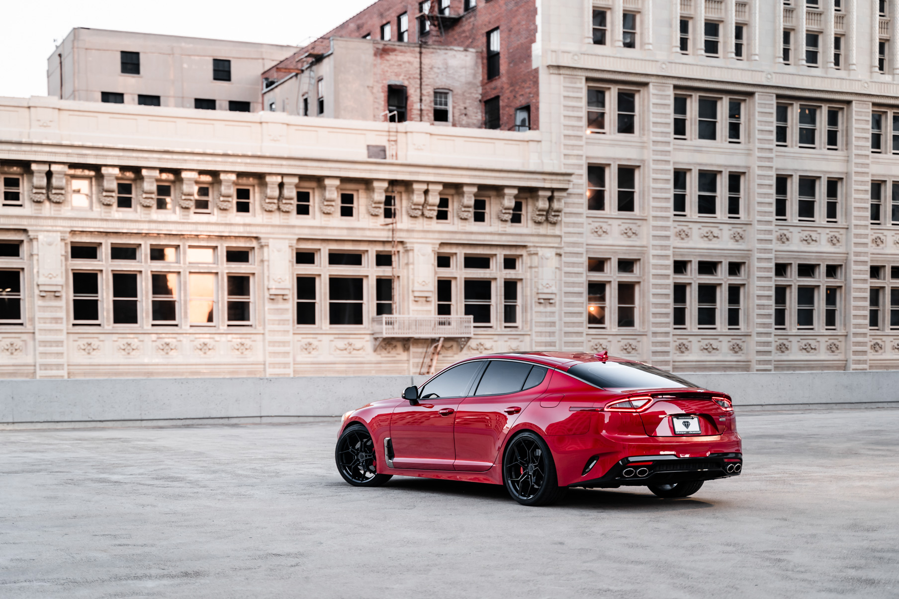 A 2019 Kia Stinger GT on 20 Inch Blaque Diamond BD-F25 Gloss Black Wheels
