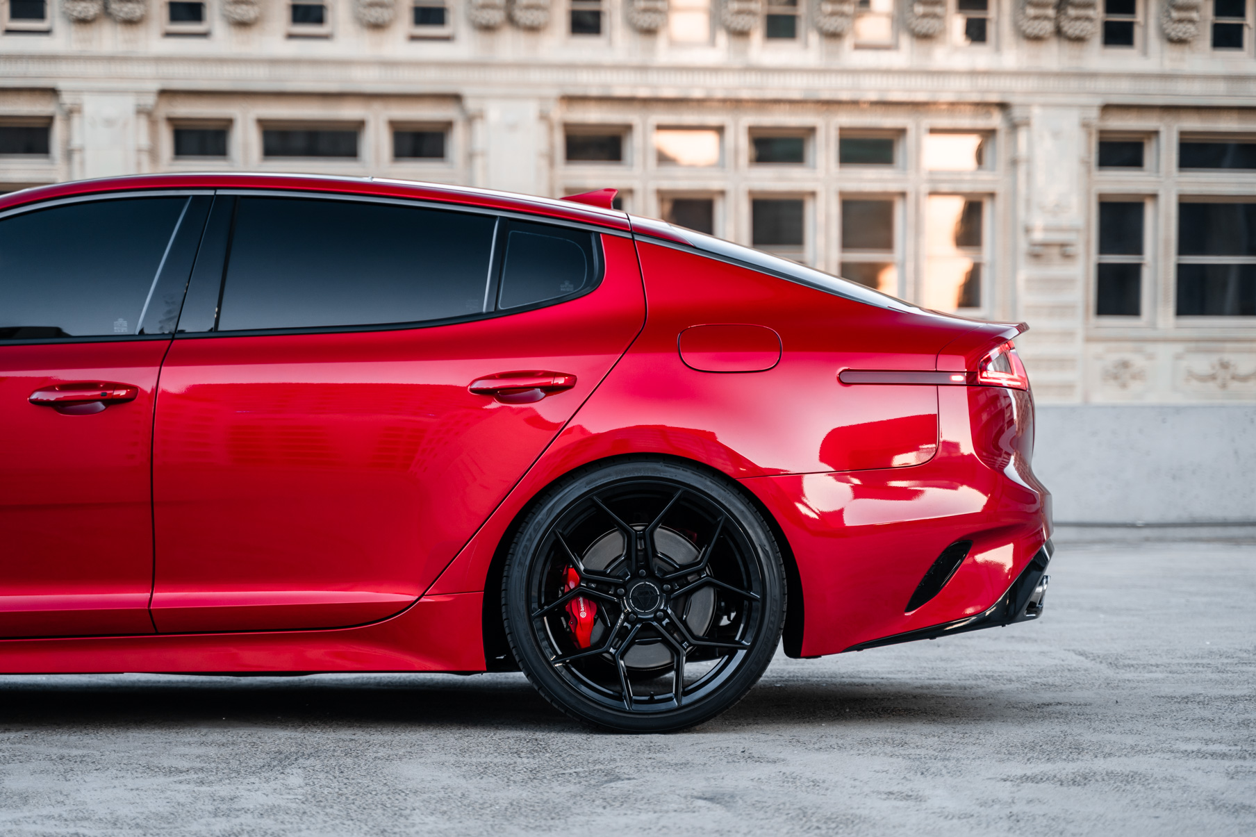 A 2019 Kia Stinger GT on 20 Inch Blaque Diamond BD-F25 Gloss Black Wheels