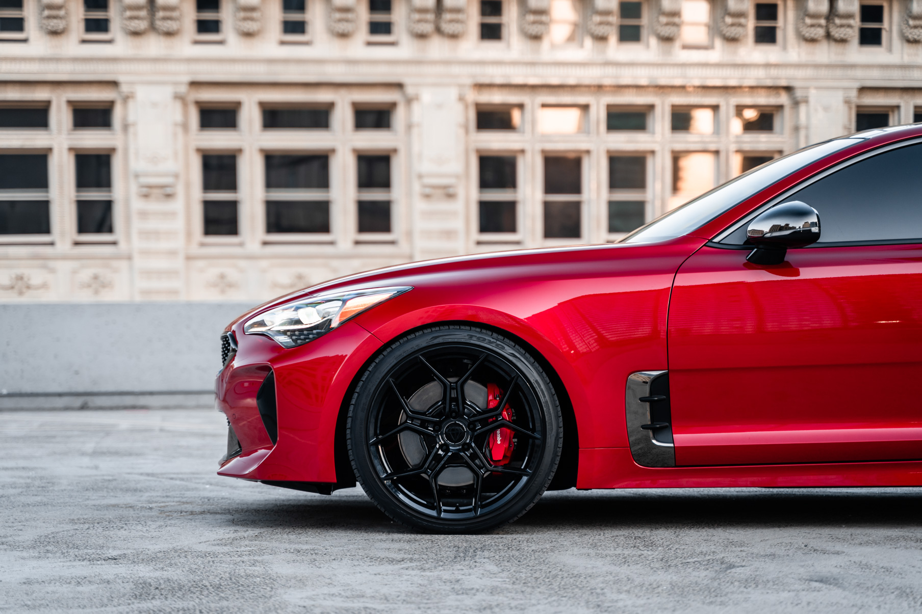 A 2019 Kia Stinger GT on 20 Inch Blaque Diamond BD-F25 Gloss Black Wheels