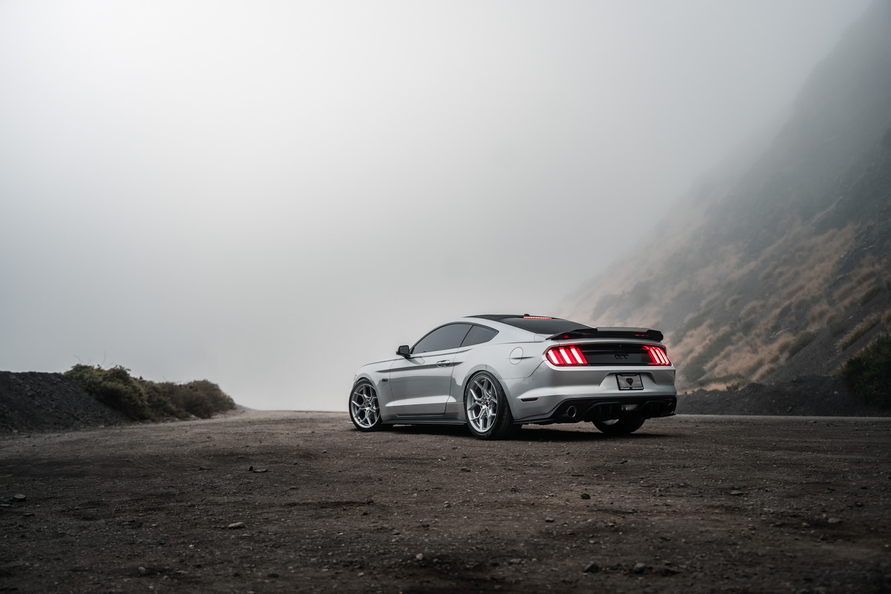 A 2016 Ford Mustang GT on 20 Inch Blaque Diamond BD-F25 Brushed Silver Wheels