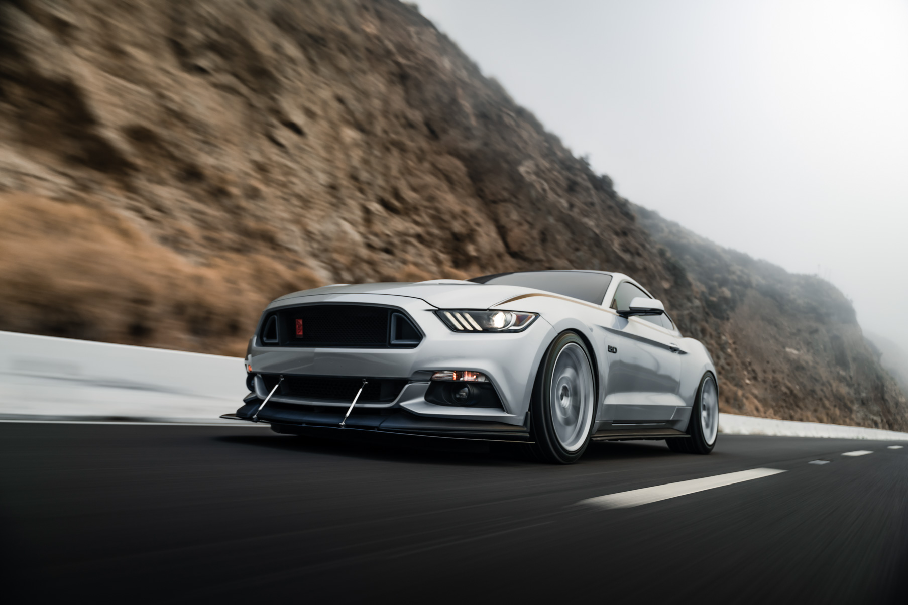 A 2016 Ford Mustang GT on 20 Inch Blaque Diamond BD-F25 Brushed Silver Wheels
