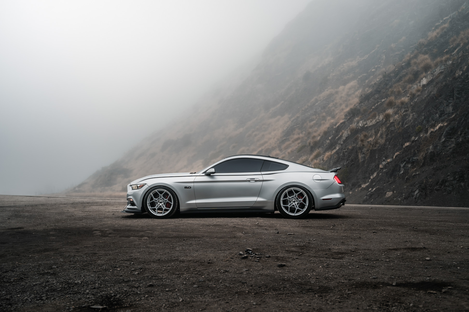 A 2016 Ford Mustang GT on 20 Inch Blaque Diamond BD-F25 Brushed Silver Wheels