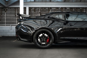 A 2018 Chevrolet Camaro ZL1 1LE on Blaque Diamond BD-F25 Gloss Black Wheels