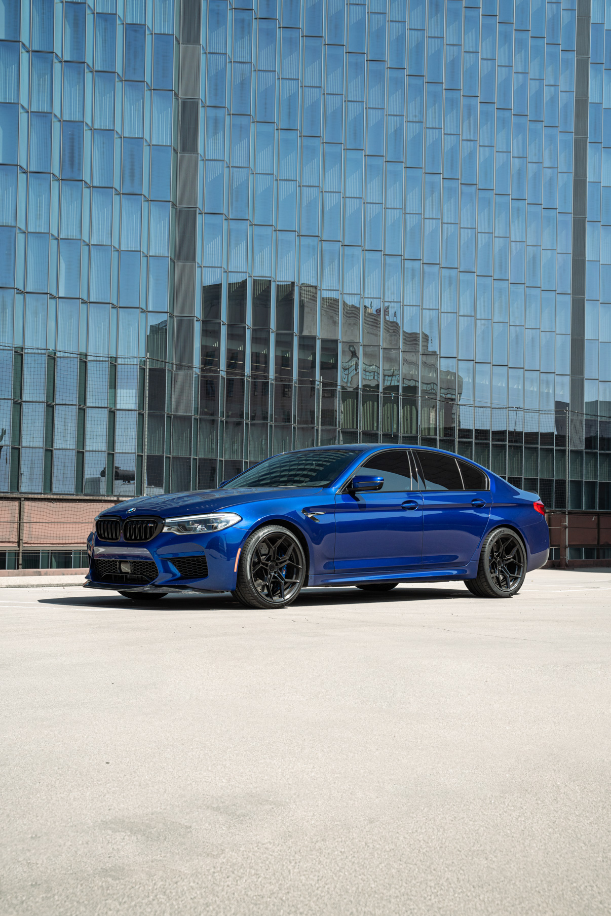 A 2020 BMW M5 on 20 Inch Blaque Diamond BD-F25 Gloss Black Wheels