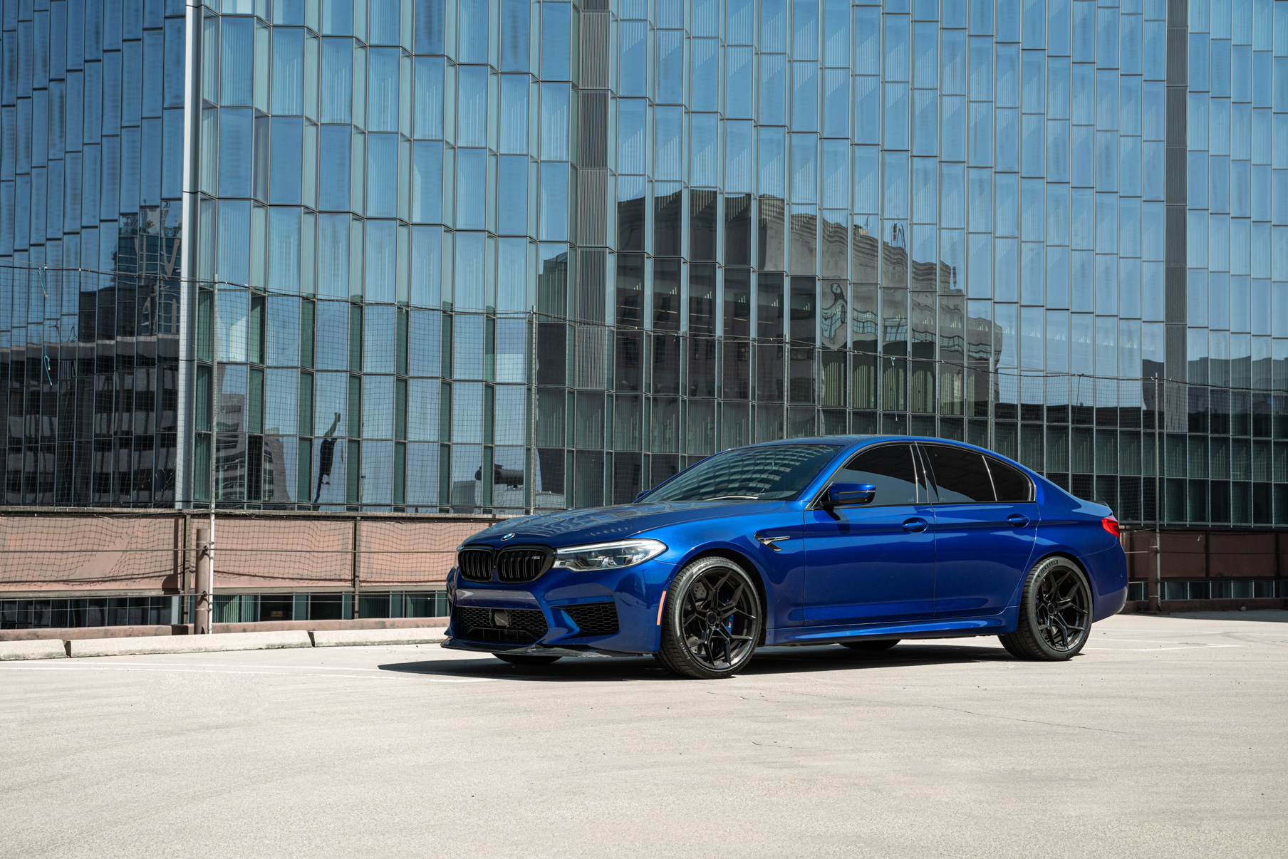 A 2020 BMW M5 on 20 Inch Blaque Diamond BD-F25 Gloss Black Wheels