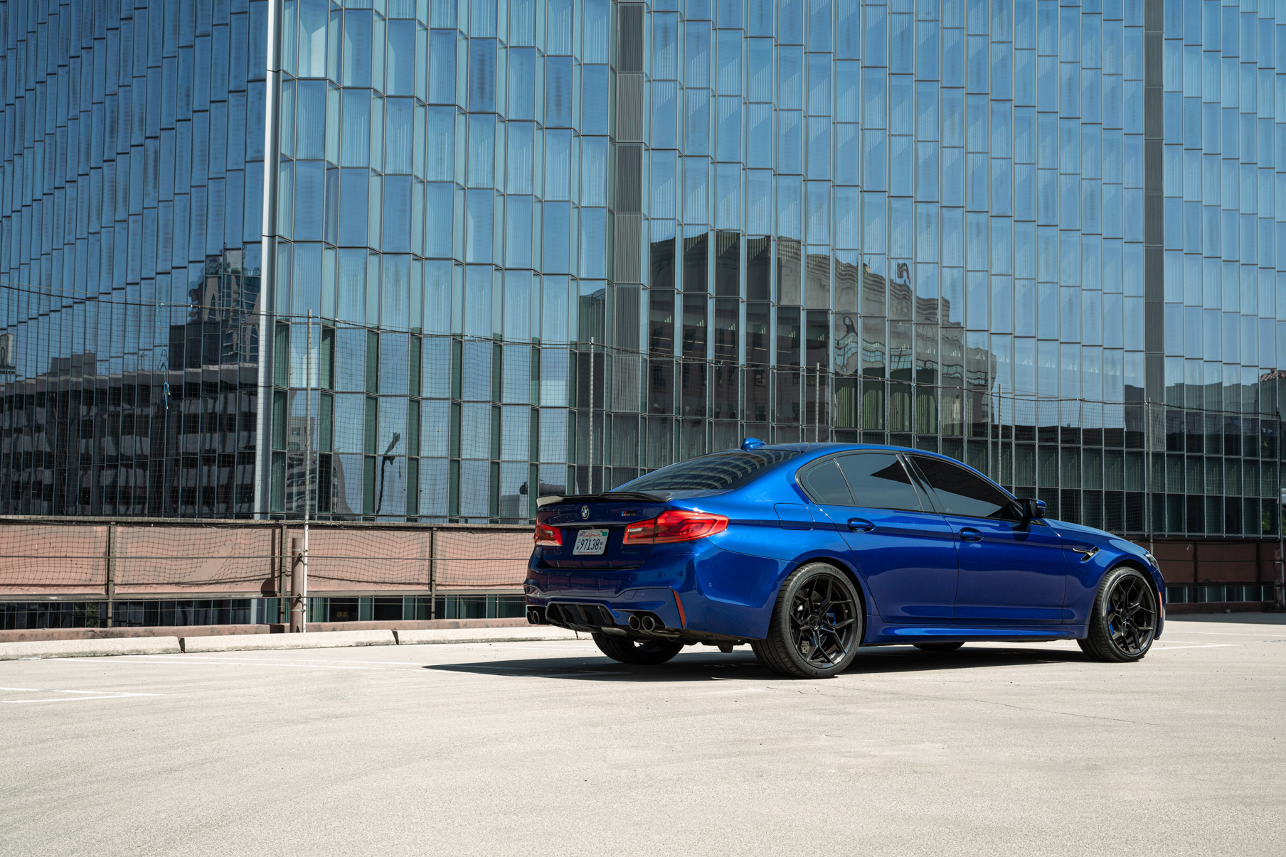 A 2020 BMW M5 on 20 Inch Blaque Diamond BD-F25 Gloss Black Wheels