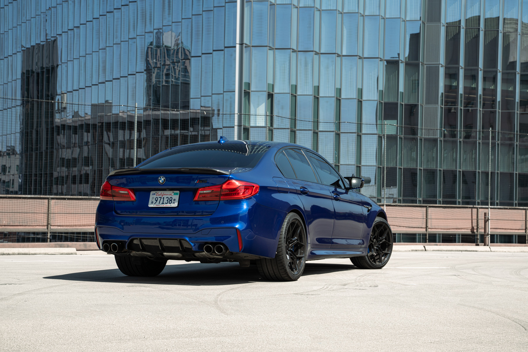 A 2020 BMW M5 on 20 Inch Blaque Diamond BD-F25 Gloss Black Wheels