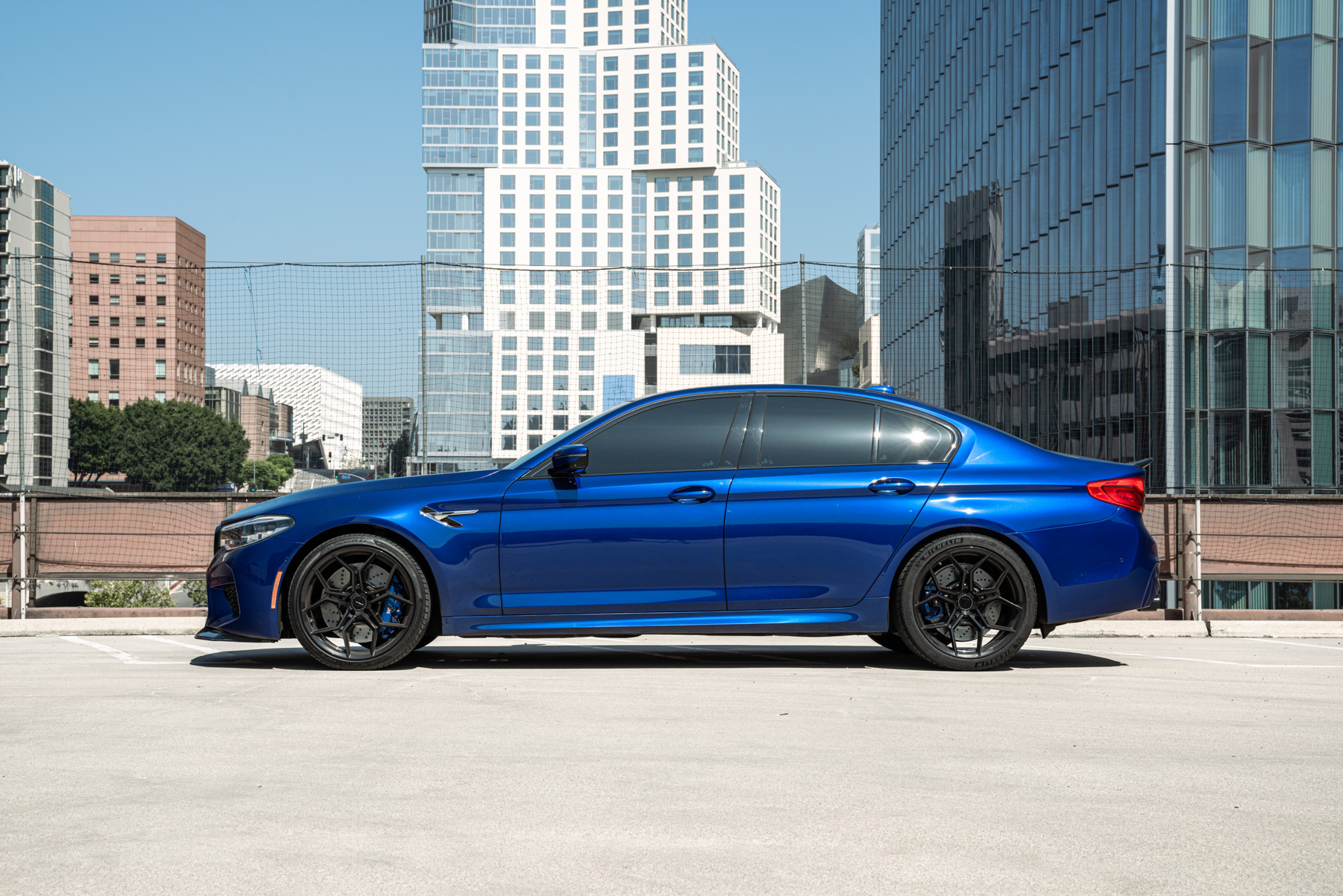 A 2020 BMW M5 on 20 Inch Blaque Diamond BD-F25 Gloss Black Wheels