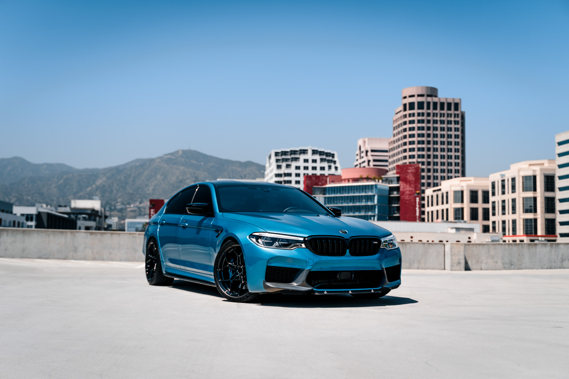 A 2020 BMW M5 on 20 Inch Blaque Diamond BD-F25 Gloss Black Wheels