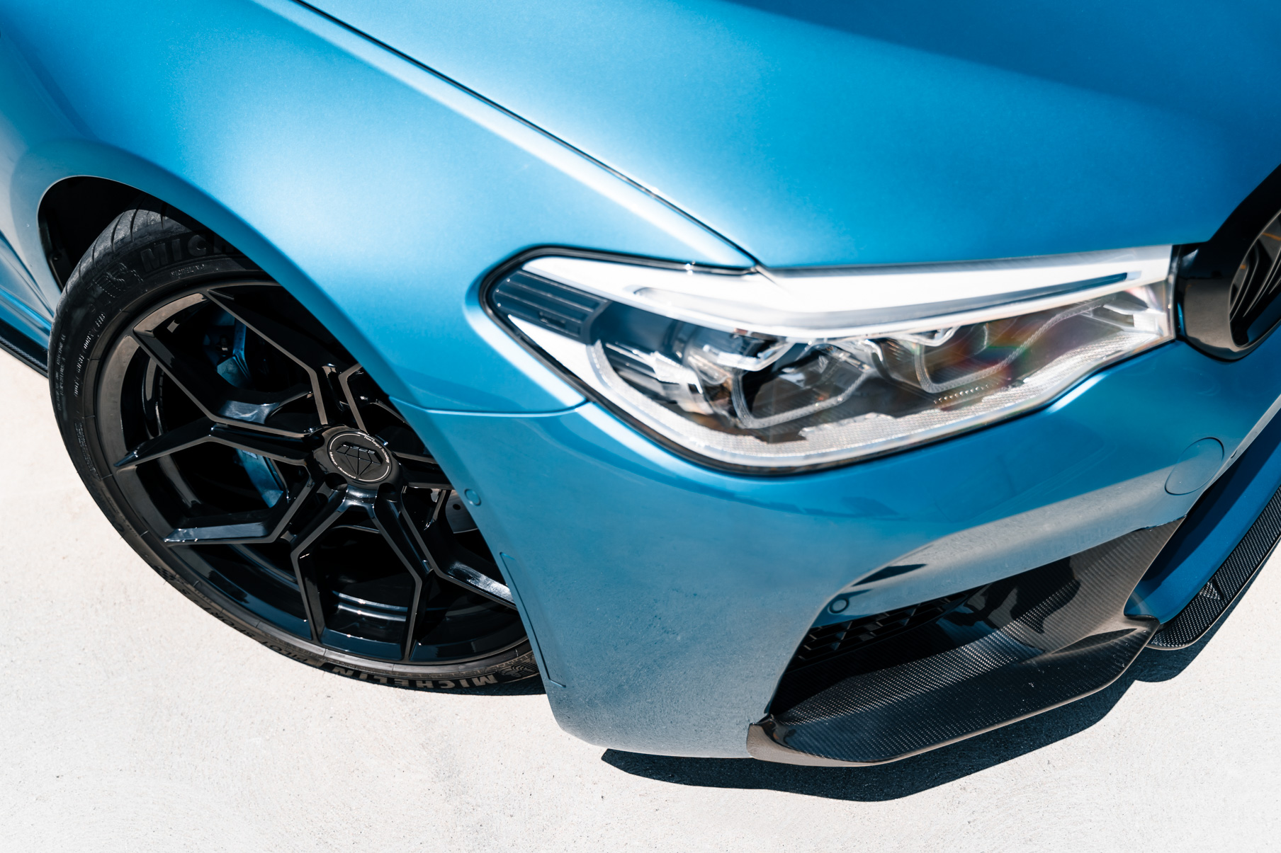 A 2020 BMW M5 on 20 Inch Blaque Diamond BD-F25 Gloss Black Wheels