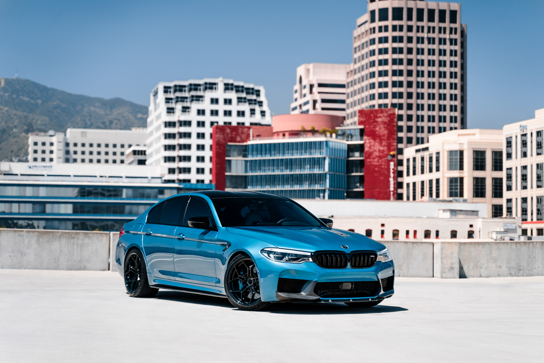 A 2020 BMW M5 on 20 Inch Blaque Diamond BD-F25 Gloss Black Wheels
