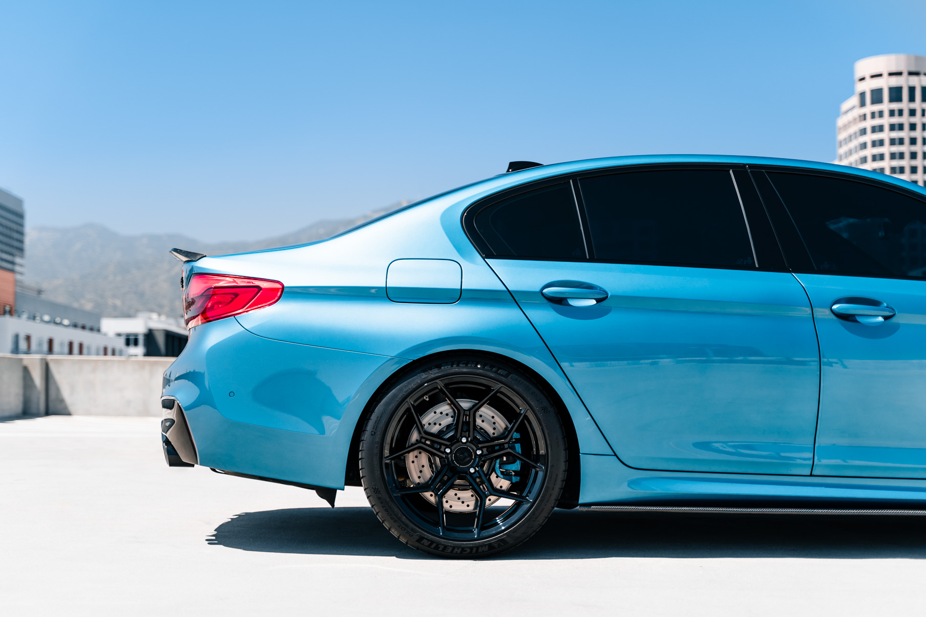 A 2020 BMW M5 on 20 Inch Blaque Diamond BD-F25 Gloss Black Wheels