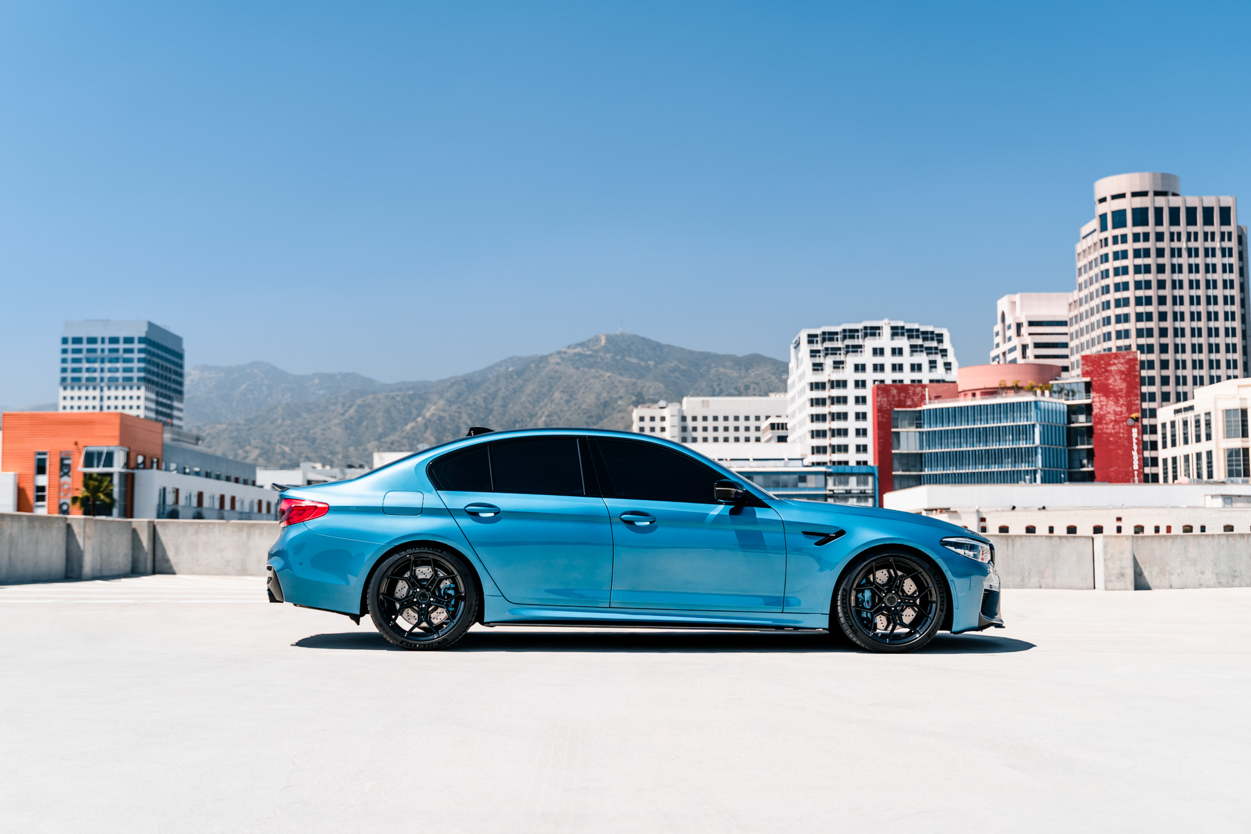 A 2020 BMW M5 on 20 Inch Blaque Diamond BD-F25 Gloss Black Wheels